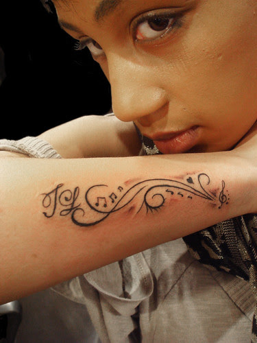  Treble Clef and pattern tattoo plus initials 