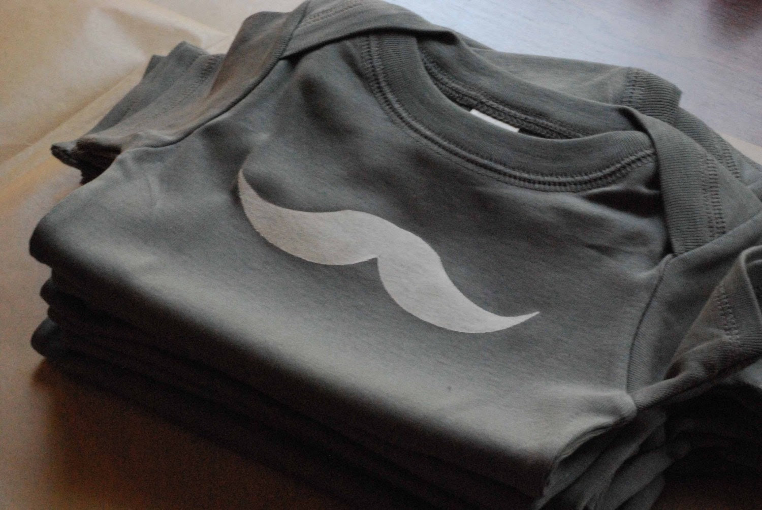 mustache onesie
