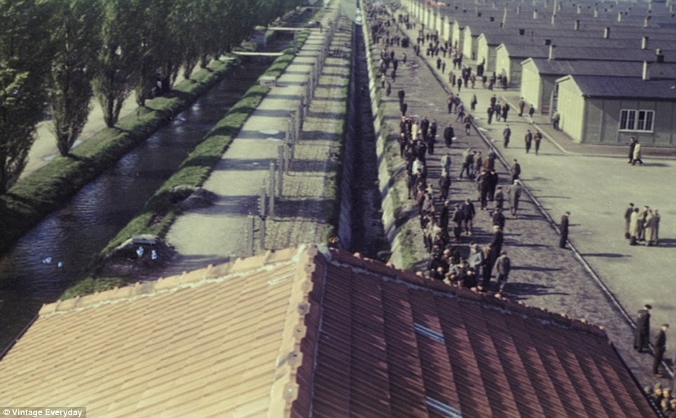 Spartan: The austere accommodation the prisoners were forced to live in can be seen on the right, while the barbed wire fence can be seen on the left