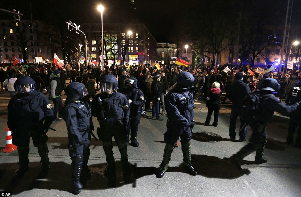 Tension: Police were on standby during the rally in Dresden, but it for the most part passed off peacefully with record attendance