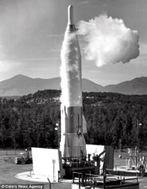 Launchpad: The home - and the 50ft silo below - once contained missiles similar to this one (left) but was converted by developer Bruce James Franscio (pictured right)