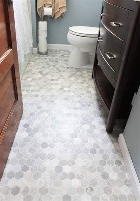 Vinyl can be installed in wet areas, does not scratch as easily as wood, and is softer underfoot. 40 gray hexagon bathroom tile ideas and pictures 2020