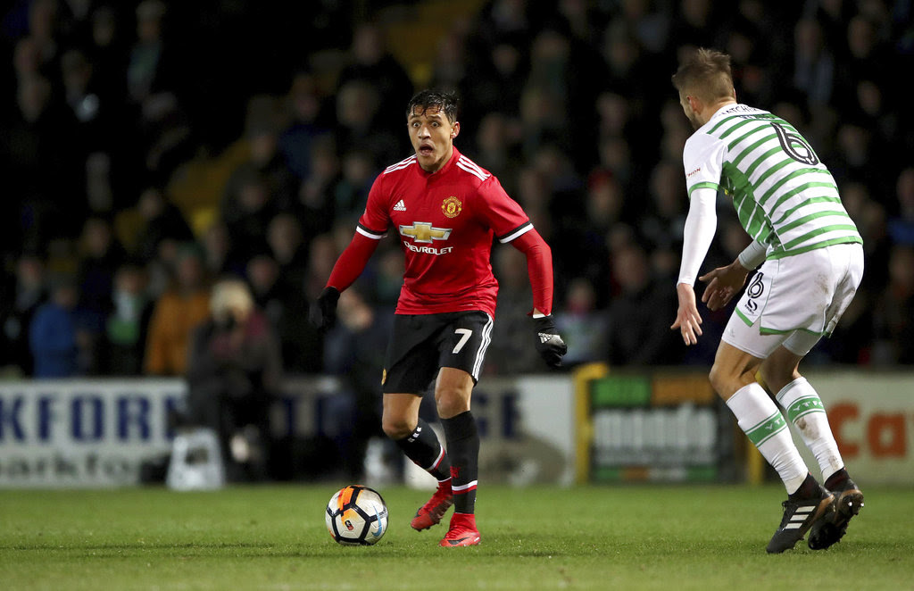Sanchez sets up 2 goals on Man United debut in FA Cup win