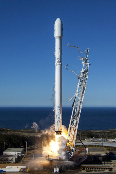 A Falcon 9 rocket carrying the Iridium NEXT satellites lifts off from SpaceX's launch pad at Vandenberg Air Force Base in California...on January 14, 2017.
