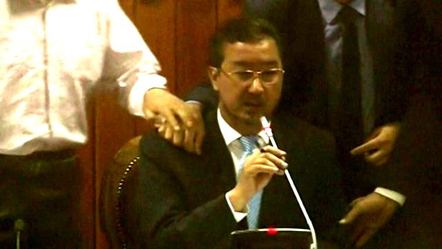Afghan parliament attack: Footage shows moment bomb explodes - BBC.