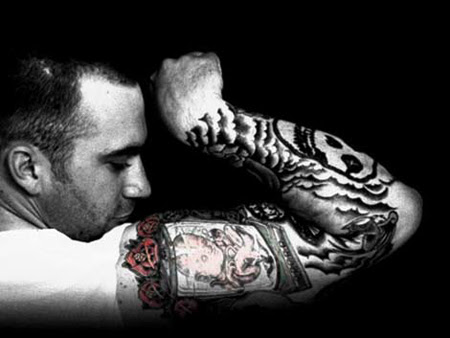 In Tattooed Under Fire, a young soldier shows off his deeply inked body and 