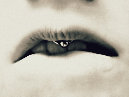 smiley piercing. Severely edited smiley.