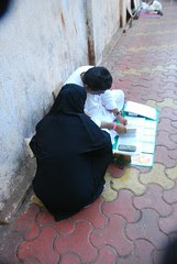 Street Astrologer and Muslim Lady by firoze shakir photographerno1