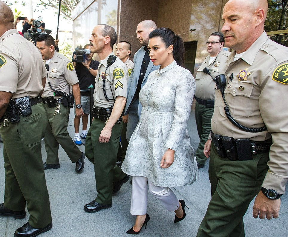 > Kim Kardashian Leaves The LA Courthouse With A Huge Police Entourage - Photo posted in Eyecandy - Celebrities and random chicks | Sign in and leave a comment below!