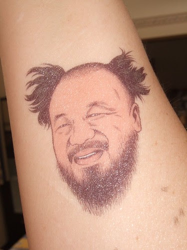 I was just in the kitchen slapping a temporary tattoo on my forearm.