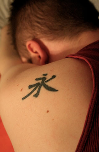 tattoos on Americans with Chinese symbols for words like love, peace, tattoos on Americans with Chinese symbols for words like love, peace,