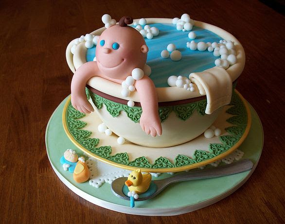 Image of lovely baby in a cup baby shower cake