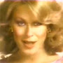 A screenshot from the classic Enjoli perfume ad of the 1970s