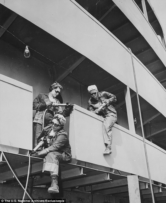 The home front: Clad in overalls, headscarves and safety goggles, three 'Chippers' get to work at Marinship Corporation, established in California in 1942 to build the ships required for the war effort