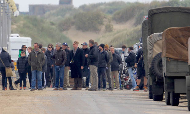 Filming takes place on the Christopher Nolan directed war movie 'Dunkirk' in the exact spot where, 76 years ago to this week, 100,000 soldiers were evacuated. During filming a number of locals were stopped from entering the beach with one person in a land yacht coming very close to driving straight across the set. Three warships circled off the coast adding to the war-like atmosphere while cast members held up cutouts of soldiers to create the illusion of more people in battle. Featuring: Christopher Nolan Where: Dunkirk, France When: 23 May 2016 Credit: WENN.com