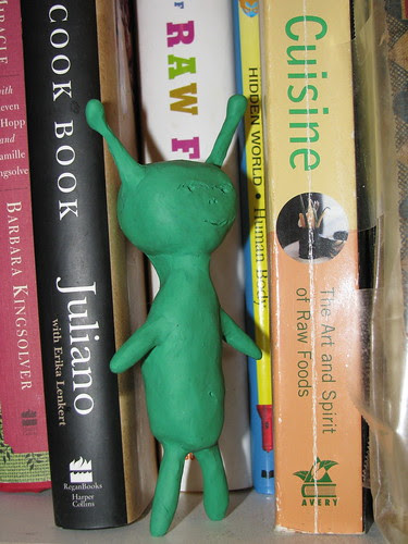 Alien at the Book Pile