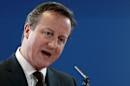 Britain's PM Cameron addresses a news conference during a EU leaders summit in Brussels