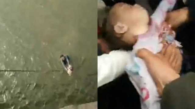 Video: Aksi Heroik Pengemudi Taksi Selamatkan Bayi yang Dibuang Ibunya ke Sungai, Doakan Smoga Kelak Jadi Anak Sholeh, AMIN...! http://ift.tt/20kt43r - Berita Terkini Terbaru Hari Ini - Sebuah video yang menunjukkan aksi heroik dan dramatis seorang supir taksi saat menyelamatkan bayi yang dibuang oleh ibunya ke sungai ini menjadi viral. Video tersebut diambil dengan kamera ponsel oleh salah seorang saksi yang ikut membantunya. Hal ini terjadi di sebuah jembatan di kota Ruzhou, Provinsi Henan, China.