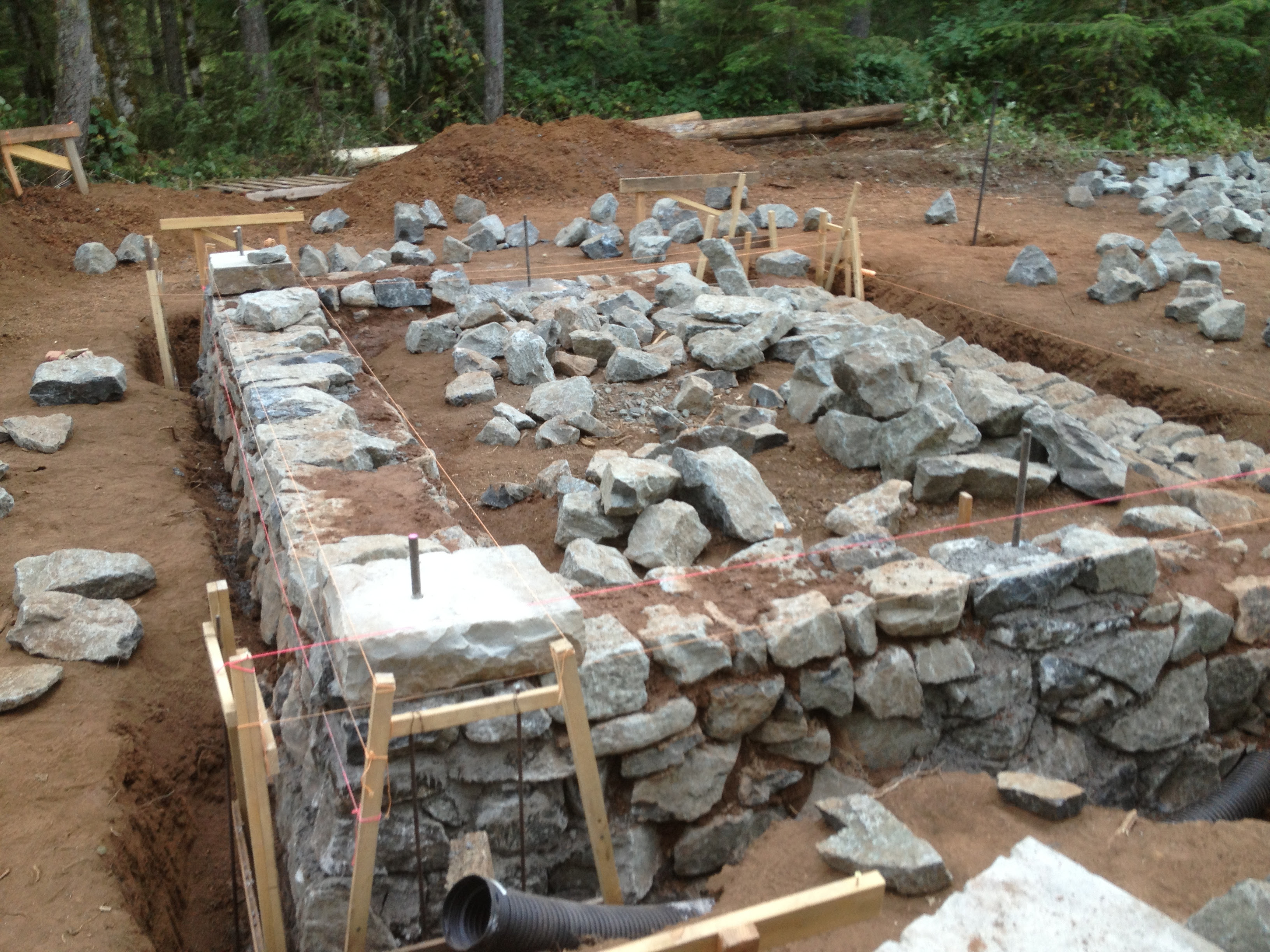 Building a stone wall on house