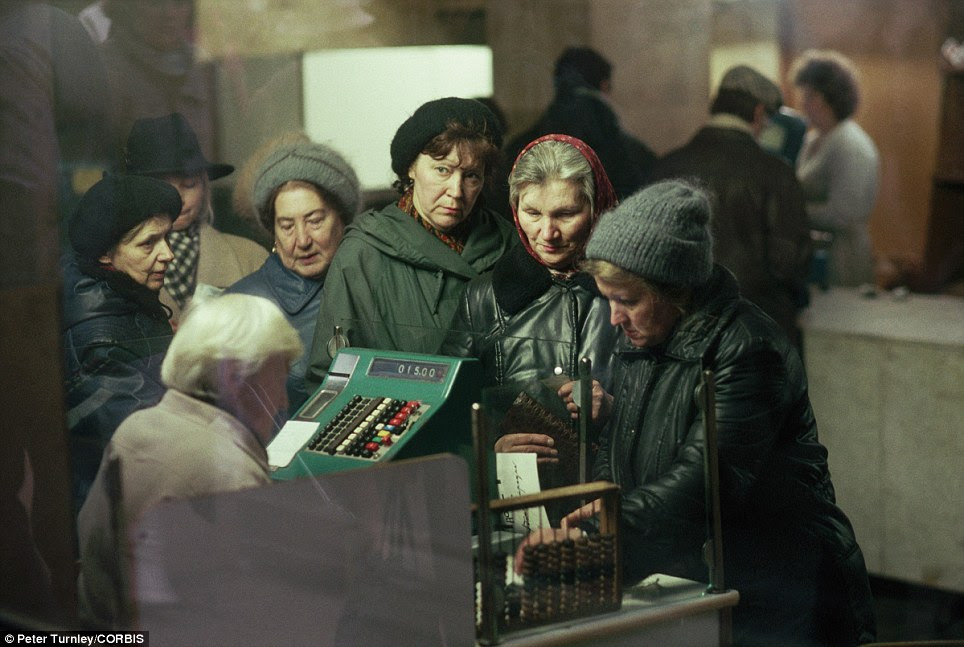 A real age of austerity: Shoppers line up at the check out stand of a store in Moscow in 1991 as the USSR neared collapse