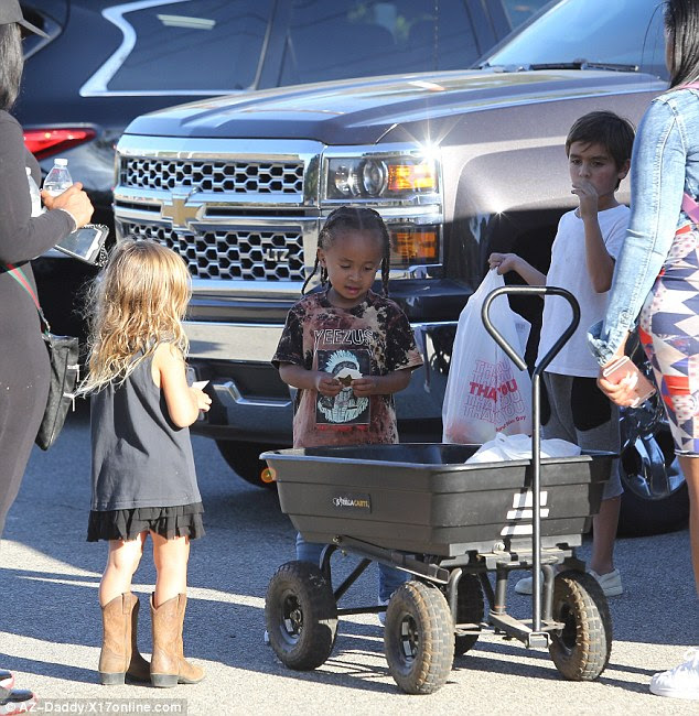 Adorable: Blac's son looked precious as he attended the pumpkin patch