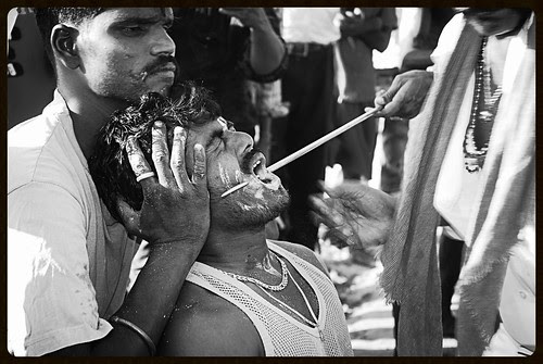 Hardcore Cheek Piercing For Goddess Marriammen by firoze shakir photographerno1