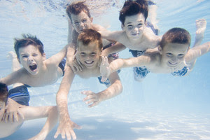 boys swimming underwater 2