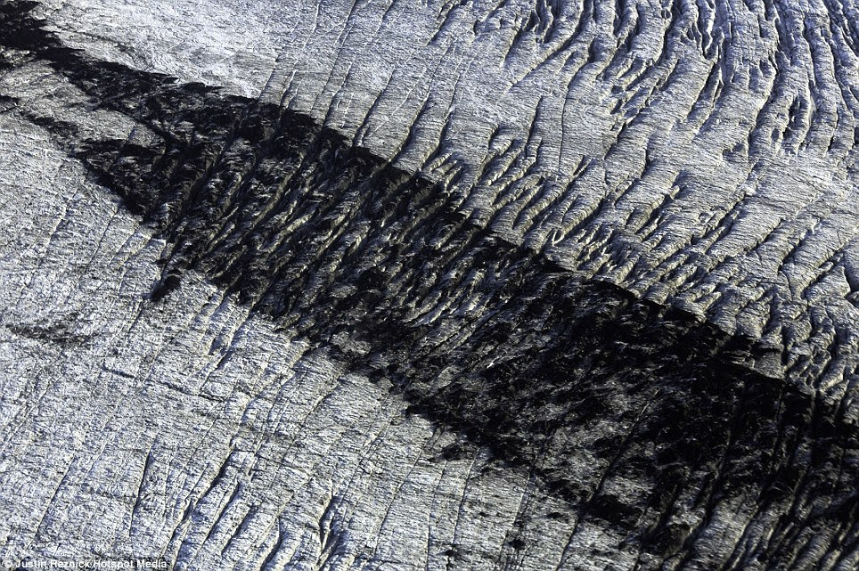 Your shadow lay across my life: American photographer Reznick's camera has captured stark colour contrasts in the geography of Iceland