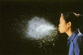 Jackie Joyner-Kersee uses an asthma inhaler after winning the 800-meter race (part of the women's heptathlon) at the World Athletics Championships in Stuttgart, Germany, July 17, 1993. Corbis/Reuters