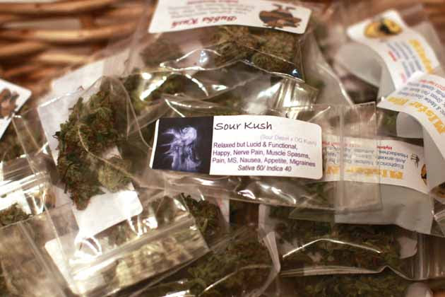 Various marijuana strains are prepared for sale at the Botanacare marijuana store ahead of their grand opening on New Year's day in Northglenn, Colorado