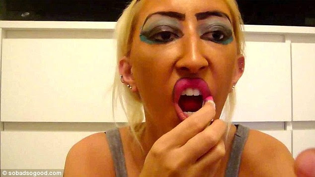 Eyes or lips? How about both? One woman goes hell for leather with face-paint-style make-up 