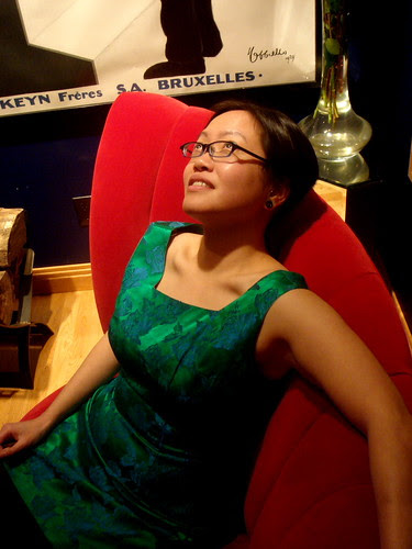 Portrait of Steph on the Red Settee