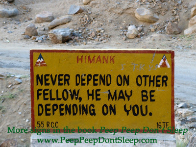 This image was taken en route from Alchi to Kargil in Ladakh. To get these images in your inbox every day or week, click here to subscribe.
Would you like to give this image a caption? Add to the comments. And if you have any funny road or shop signs you would like to contribute to this blog, send them to ajay@ajayjain.com. Full attribution will be given.