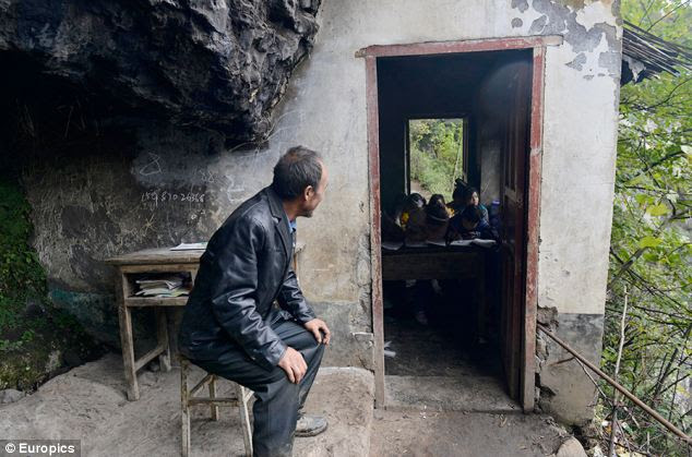 Desperate: Their teacher, Yuan Helun, has been working here for 13 years but feels sorry for the kids