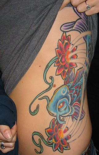 Fish Tattoo on Abdomen / Hip tattoo on hip. Fish Tattoo on Abdomen / Hip