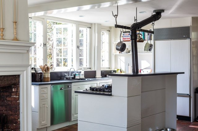 The kitchen mixes new and old. 
