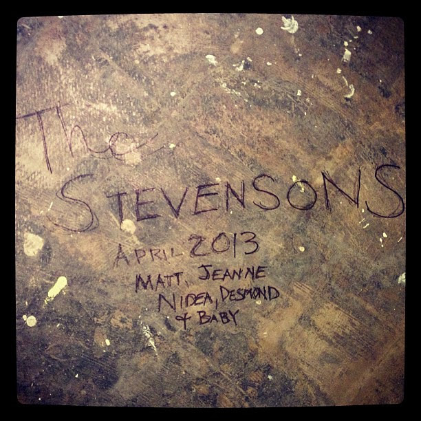 I left this message on the concrete floor for whoever pulls up the carpet that is being installed over it today. #timecapsule #renovation #hiddenmessage #latergram