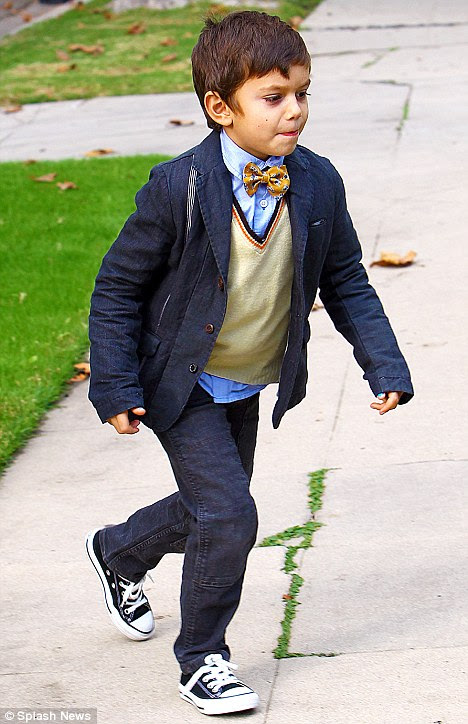 Dashing: Kingston appeared to be extremely excited about the holiday as he ran ahead of the clan