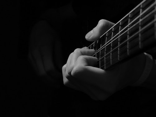 Playing guitar