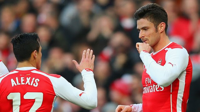 Arsenal's Olivier Giroud and Alexis Sanchez celebrate during the win against Middlesbrough.