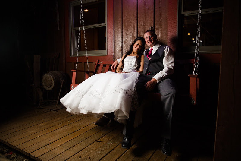 End of the night photos with the bride and groom at Kilbuck Creek. These nighttime portraits were taken on the porch, swing set and other fun places around the grounds at Kilbuck Creek during their wedding reception.
