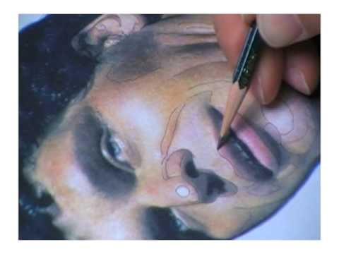 Angeles applies some traditional Japanese Tebori tattooing techniques.