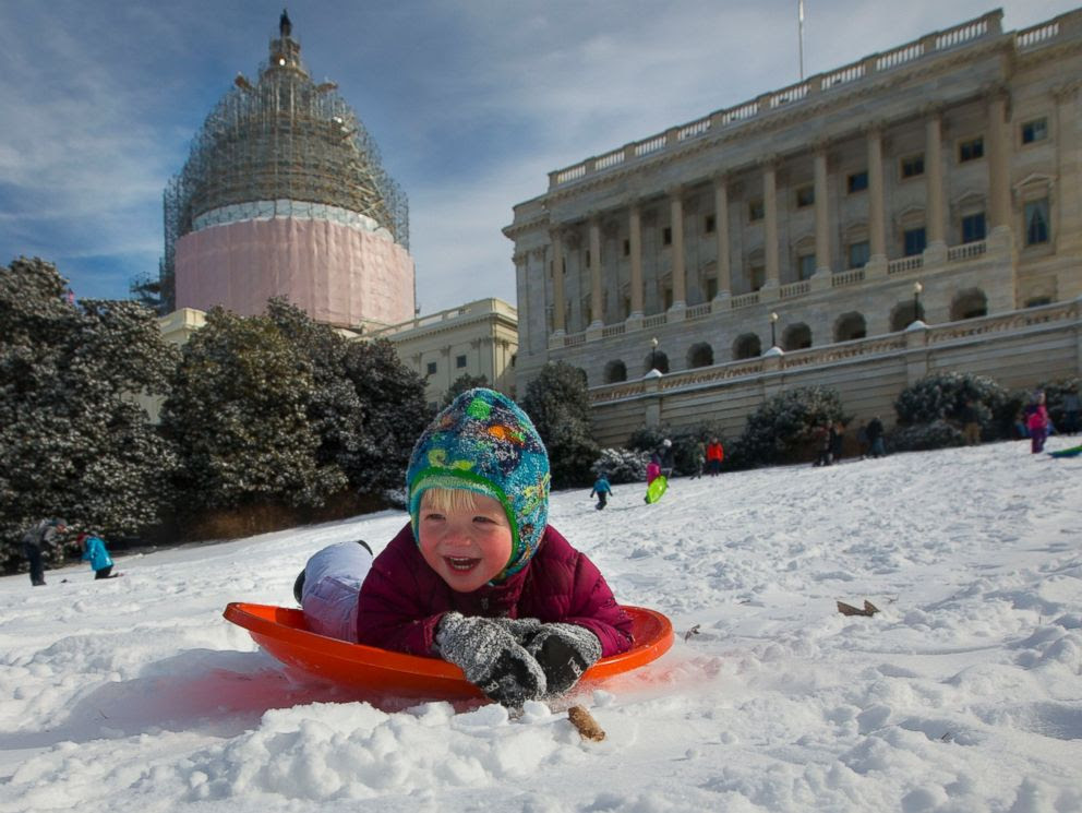 PHOTO: James Drobnyk, 2, joins others in sledding down the hill on Capitol Hill in Washington, D.C. on Feb. 17, 2015. 