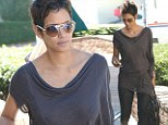 You'd have missed this in France! Halle Berry is curvaceous in sheer top as she enjoys the California sunshine 