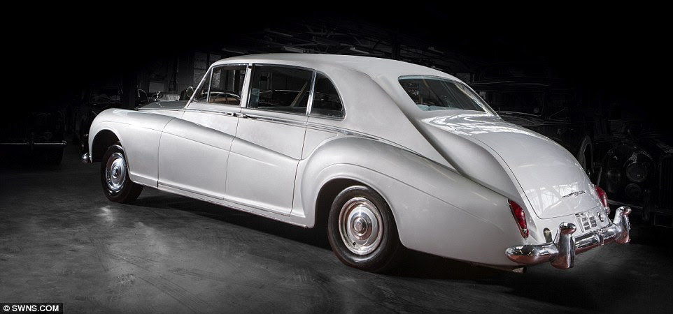 Luxurious: He bought the car in 1963 and sent it to a coach builder to have it equipped with the latest gadgets. The car was initially midnight blue, but he was forced to repaint it light silver because his mother's chickens kept pecking at it
