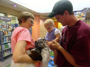 Elizabeth meets Caesar during Paws to Read.