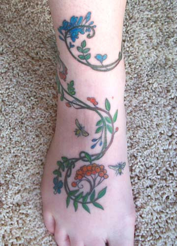 Rowan Indigo tattoo color front. Designed by fantasy artist Meredith Dillman 