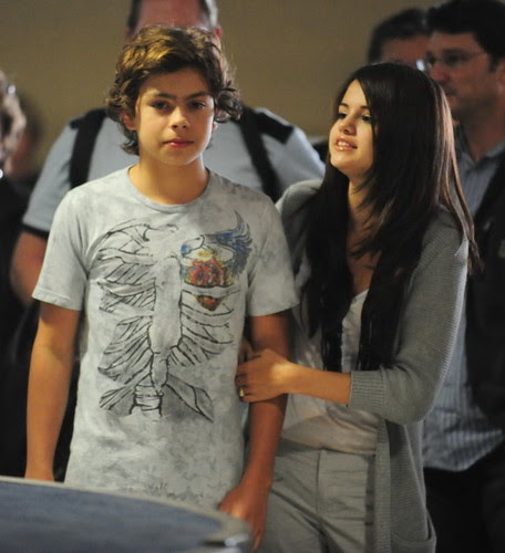 Selena Gomez And Co-Star Jake Austin Stay Close At LAX