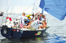 kids and family learning how to sail on J/24s