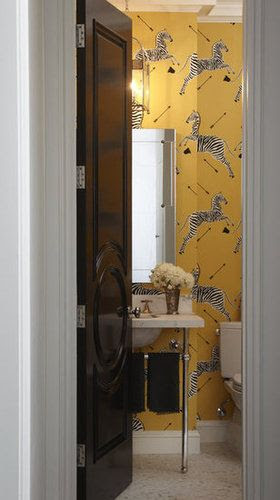 PS: I've noticed that this Scalamandre wall-covering works particularly well in smaller, transitional spaces, like powder rooms and hallways. What do you love most about it, and why did you choose it for this project? LR: I love that the paper is happy! I love its iconic, rich color and movement. It was the perfect selection for the project; it's spirited, graphic, and timeless.